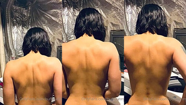 fit gym girl Womanwearingred showing off her bare back muscles